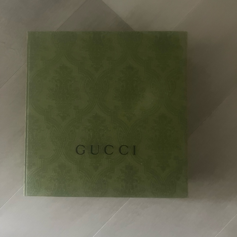 Gucci Embossed belt with silver buckle